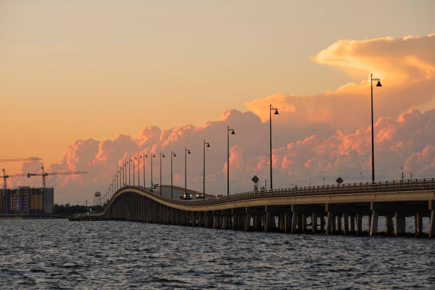 istock Barron Collier Bridge and Gilchrist Bridge in Florida with moving traffic. Transportation infrastructure in Charlotte County connecting Punta Gorda and Port Charlotte over Peace River 1769877596