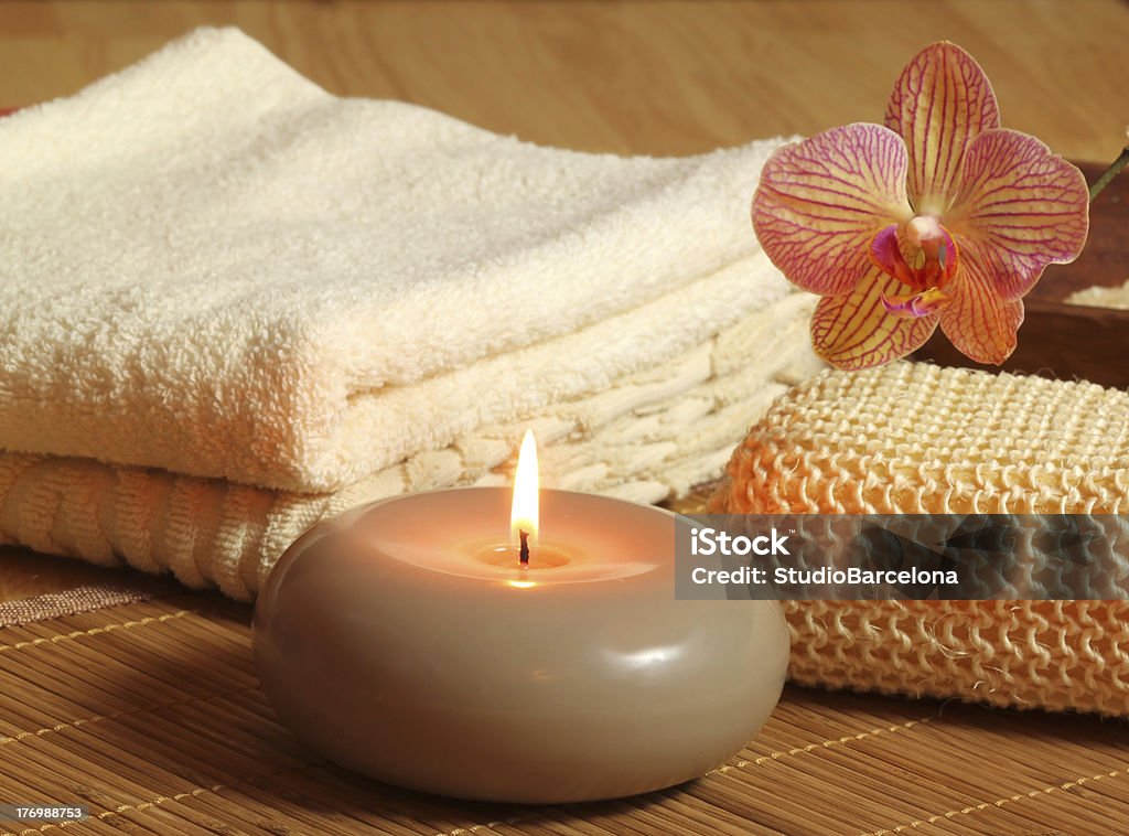 Spa relax Spa treatment for beauty and relax. Candle and orchid flower Alternative Medicine Stock Photo