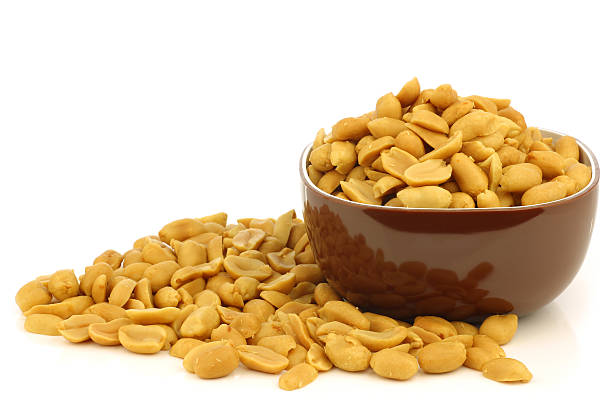 istock tasty peanuts in a brown bowl 176988756