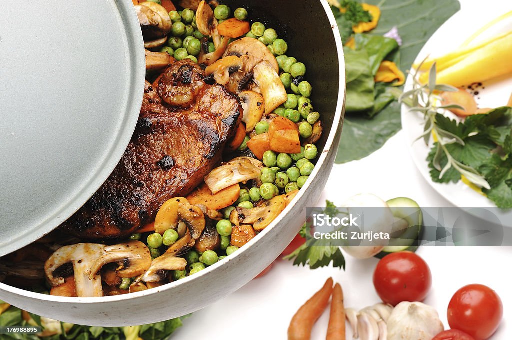 Preparing meat and vegetables for lunch "Preparing meat and vegetables for lunch, very delicious and good looking" Bean Stock Photo