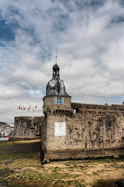 istock Concarneau (Brittany) - The clock tower with sundial and bell 176988900