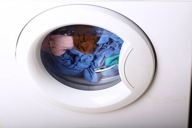 istock towels in washing machine cloths 176989217