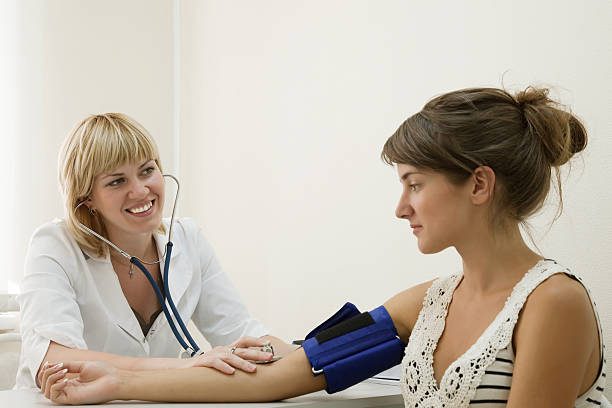 istock doctor examining the patient 176989372