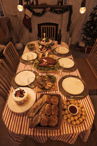istock Christmas and thanksgiving family dinner table background concept 1769897810