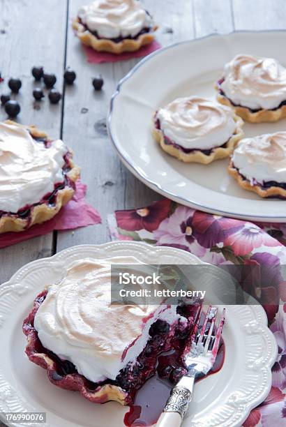 Tartlets With Black Currant And Meringue Stock Photo - Download Image Now - Baking, Berry Fruit, Black Currant