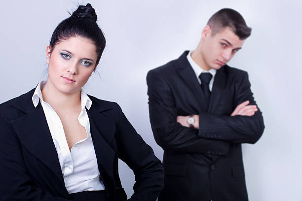 istock businessman and woman 176990320