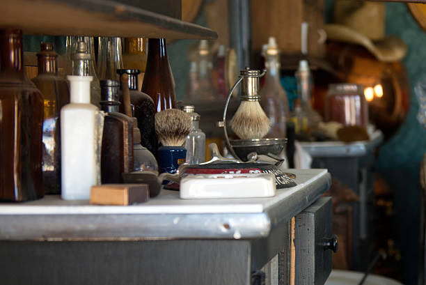 istock Old barber shop, brushes and bottles 176990858