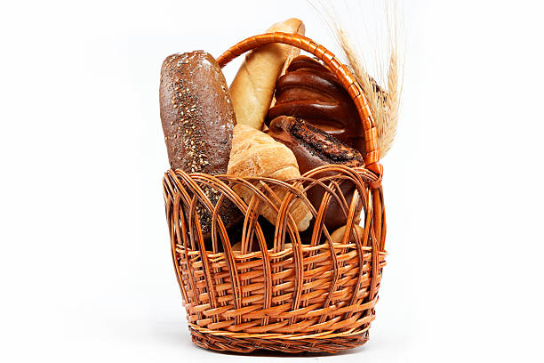 istock Fresh bread in the basket fully isolated. 176991205