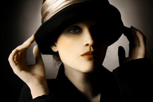 Retro portrait of woman in hat. Elegant vintage fashion lady.