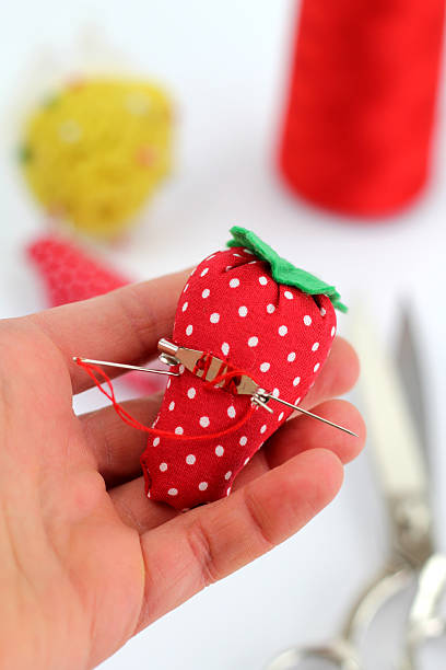 Textile strawberry brooch stock photo