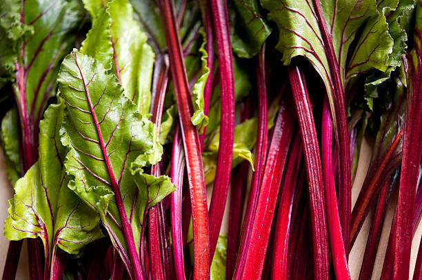 Close-up of a bunch of beet greens stock photo