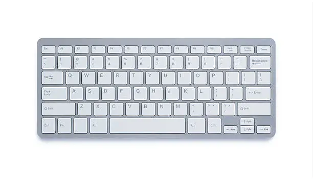 Modern aluminum computer keyboard isolated on white background with clipping path