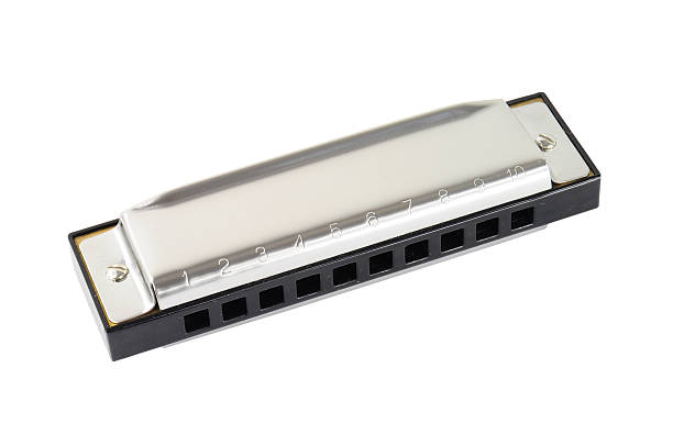 Harmonica Silver diatonic blues harp isolated on white harmonica stock pictures, royalty-free photos & images