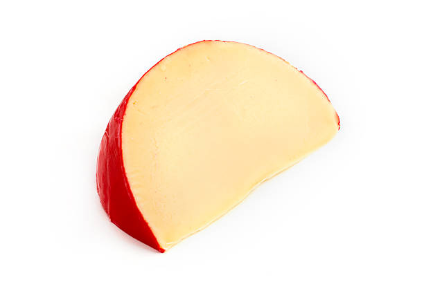 эдамский сыр сыр ломтик над белым - cheese isolated portion dutch culture стоковые фото и изображения