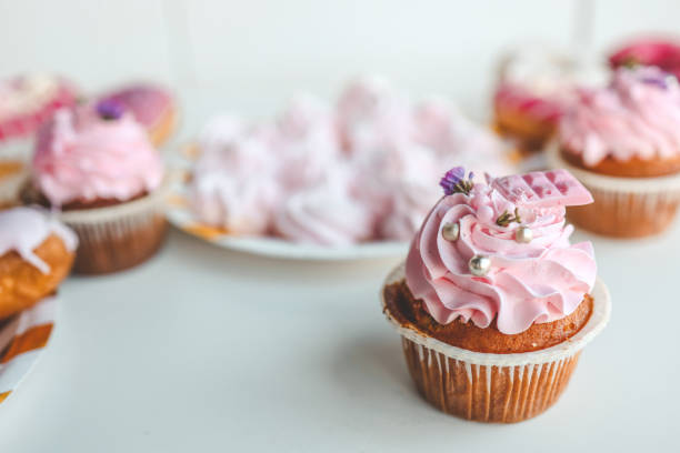 istock Set of sweets, cupcakes, eclairs and marshmallows, festive candy bar 1769956796