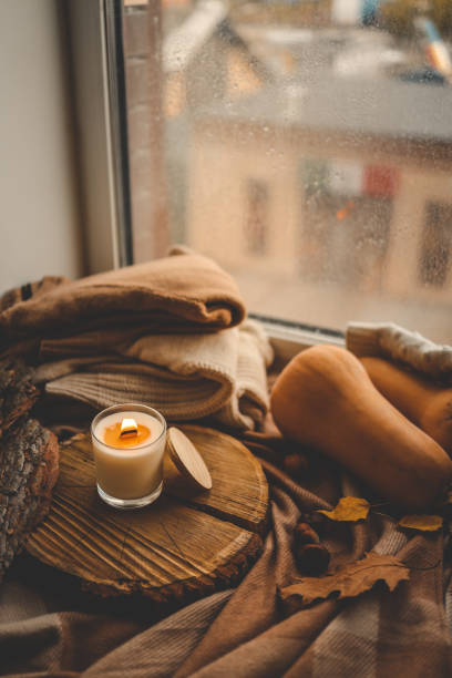 istock Burning candle in home interior, autumn aesthetics 1769959145