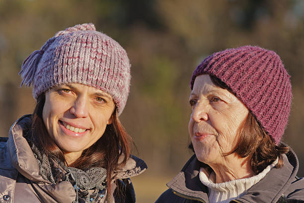 istock Mother and daughter in knitted beanies 176996364