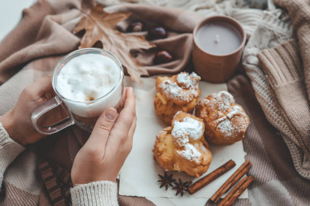 istock Cup of coffee in hands, cozy autumn 1769965108