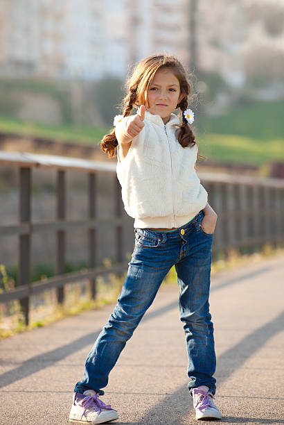 istock child with thumb up for success 176996750