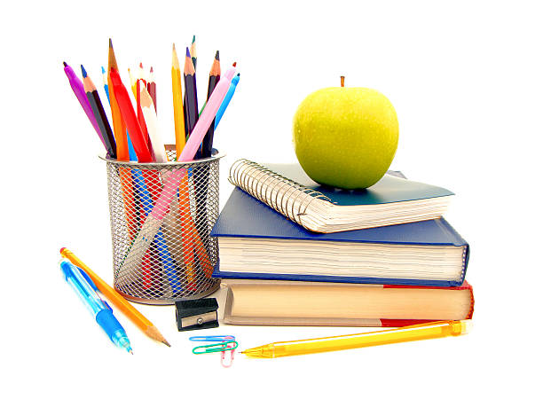 istock School supplies and textbooks over white 176996856