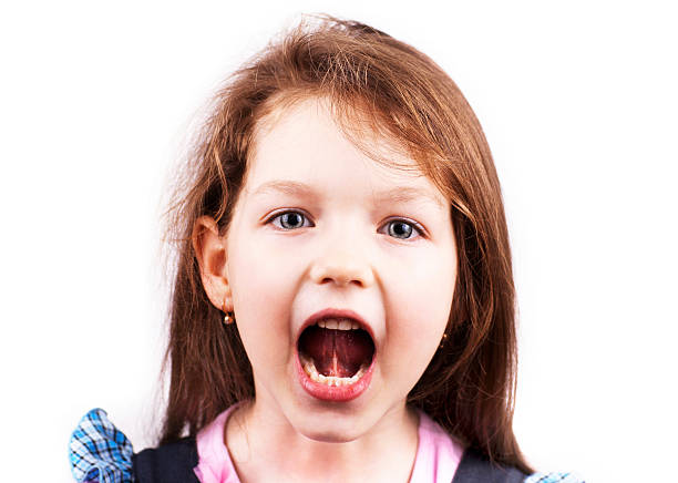istock Screaming little girl isolated 176997602