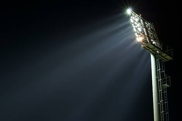 istock Stadium lights turned on and some insects at night 176997684