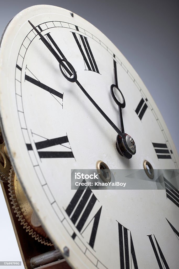 Clock face of an antique watch close up of an antique clock.This specific clock was built more than 100 years ago and is still running today.Please see my related pictures: Grandfather Clock Stock Photo