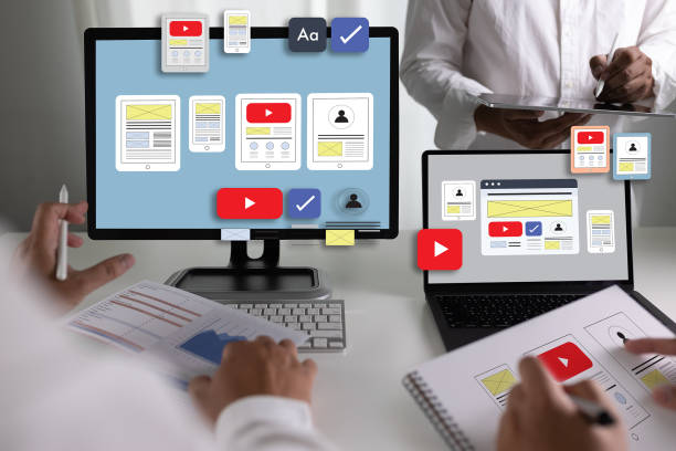 istock Team designers work on UI and UX designs for mobile app technology, digital interfaces, mobile screens, and mobile phone application design. 1769980574