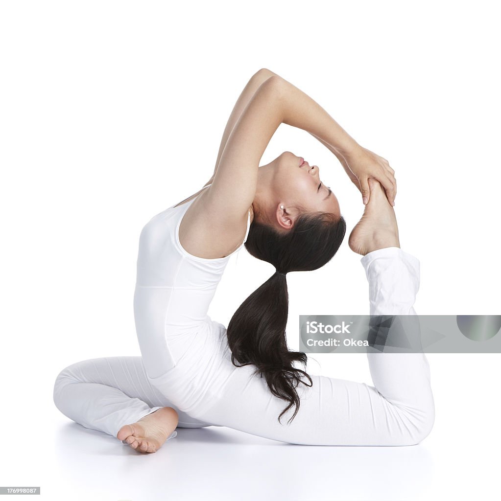 yoga female asian teenager doing yoga against white background Active Lifestyle Stock Photo