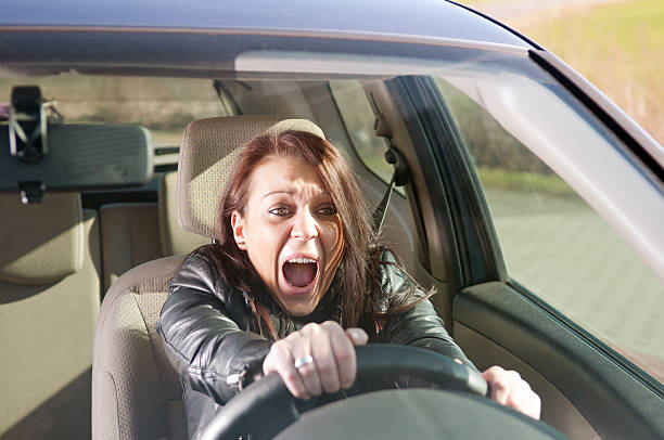 istock woman screaming in the car 176998218