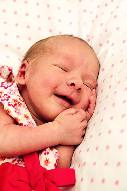 istock Adorable sleeping newborn baby girl 176998341