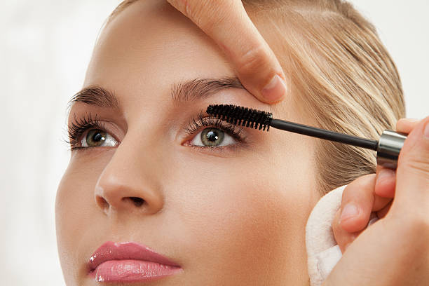 istock separating and curling lashes with mascara brush 176998995