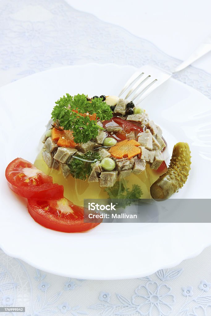 Jellied tongue and vegetables Jellied beef tongue with horseradish and vegetables Appetizer Stock Photo