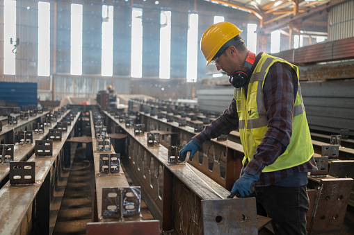 Industrial Worker Working In An Industrial Factory