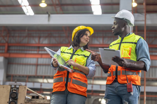 istock Factory metal workers install solar panels, cut costs, earn carbon credits, combat climate change. 1770017342