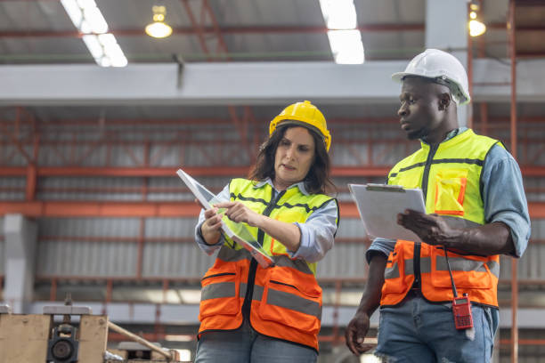 istock Factory metal workers install solar panels, cut costs, earn carbon credits, combat climate change. 1770019476