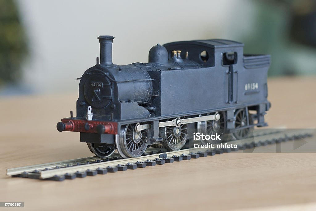 Model Steam Train Detailed and scale model of an old steam train locomotive. Train Set Stock Photo