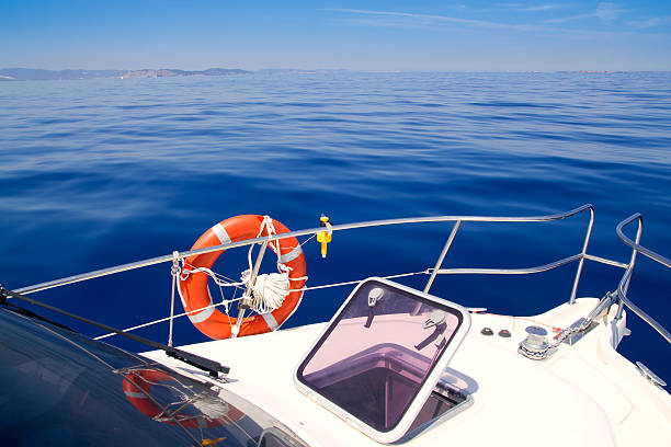 istock Boat bow open porthole sailing blue calm sea 177003286