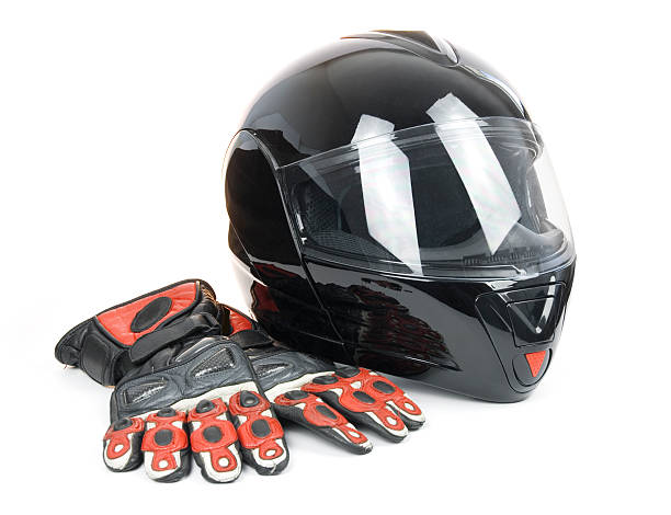 istock Black, shiny motorcycle helmet and leather biker gloves 177004283