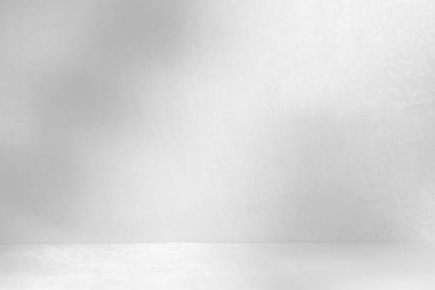 istock Blur shadow of leaves on white fabric. white cloth background soft 1770055994