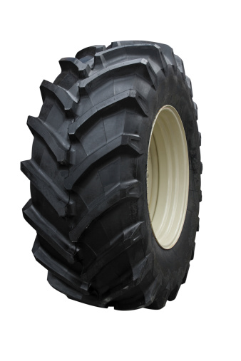 Tractor tire on white background