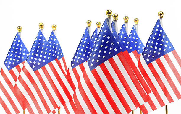 istock us flags hanging on the gold flagpole 177005777