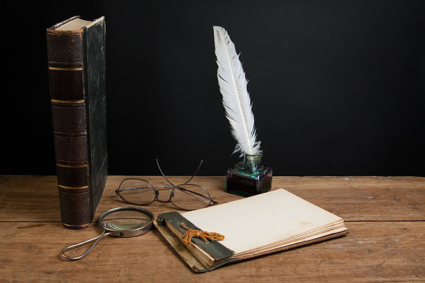istock Antique notebook, quill and inkwell, magnifying glass, book, spectacles 177006044
