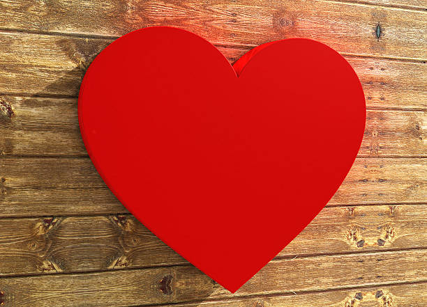 istock Heart shape on wood background 177006060