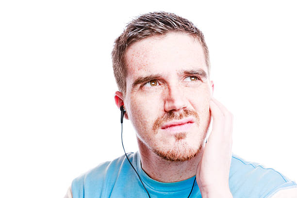 istock Man is Annoyed by Bad Music 177006214