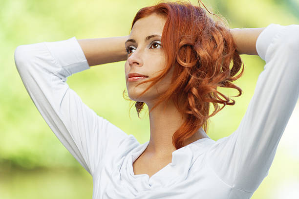 istock beautiful woman put her head in hands 177006585