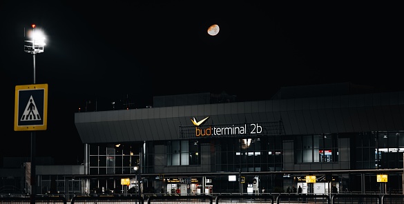 Budapest, Hungary – October 11, 2023: An airport terminal at night in Budapest, Hungary