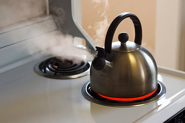 Steaming Tea Kettle stock photo