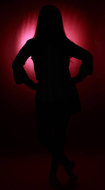 istock Beautiful Chinese girl Silhouette Isolated On red. 177007263