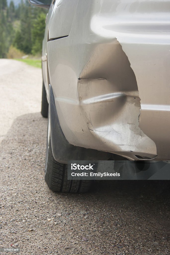 Damage Damage on the rear bumper of a car after a car accident. Bumper Stock Photo